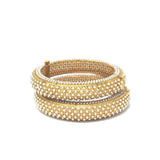 Gold Bangle With Embedded Pearls