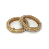 Gold Bangle With Embedded Pearls