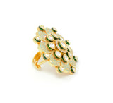 Gold Kundan Ring With Green Carvings and White Stones Around Centered Kundan Piece
