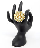 Gold Kundan Ring With Green Carvings and White Stones Around Centered Kundan Piece