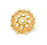 Gold Kundan Ring With Red Carvings and White Stones Around Centered Kundan Piece