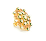 Gold Kundan Ring With Red Carvings and White Stones Around Centered Kundan Piece