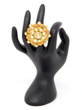 Gold Kundan Ring With Red Carvings and White Stones Around Centered Kundan Piece