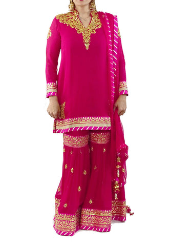 magenta color georgette fabric gota patti work kurta and sharara set